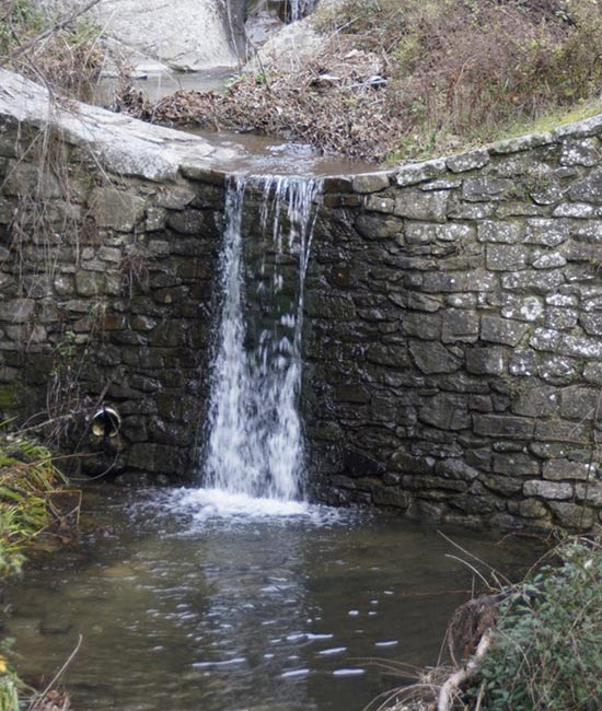 The photo shows a little waterfall